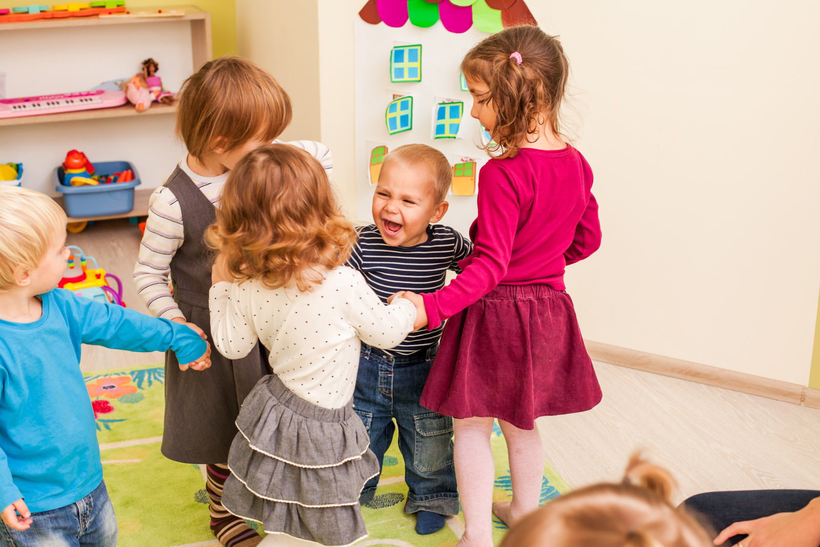 Group of Little Children Dancing in Nursery